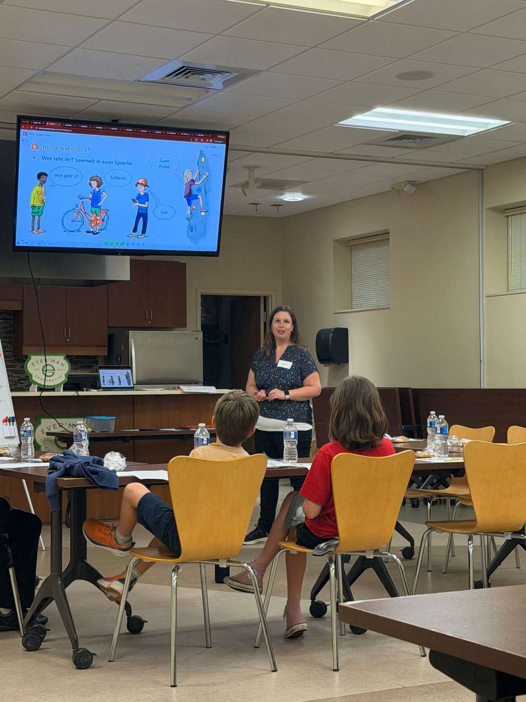 German language class with teacher and students structured learning environment Pensacola German4FUN